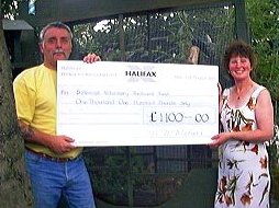 Andy and Margaret McMahon with a Donation